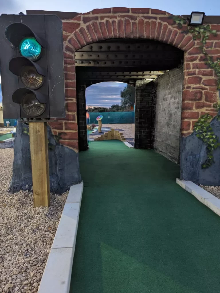 Railway theming integrated into the finished course
